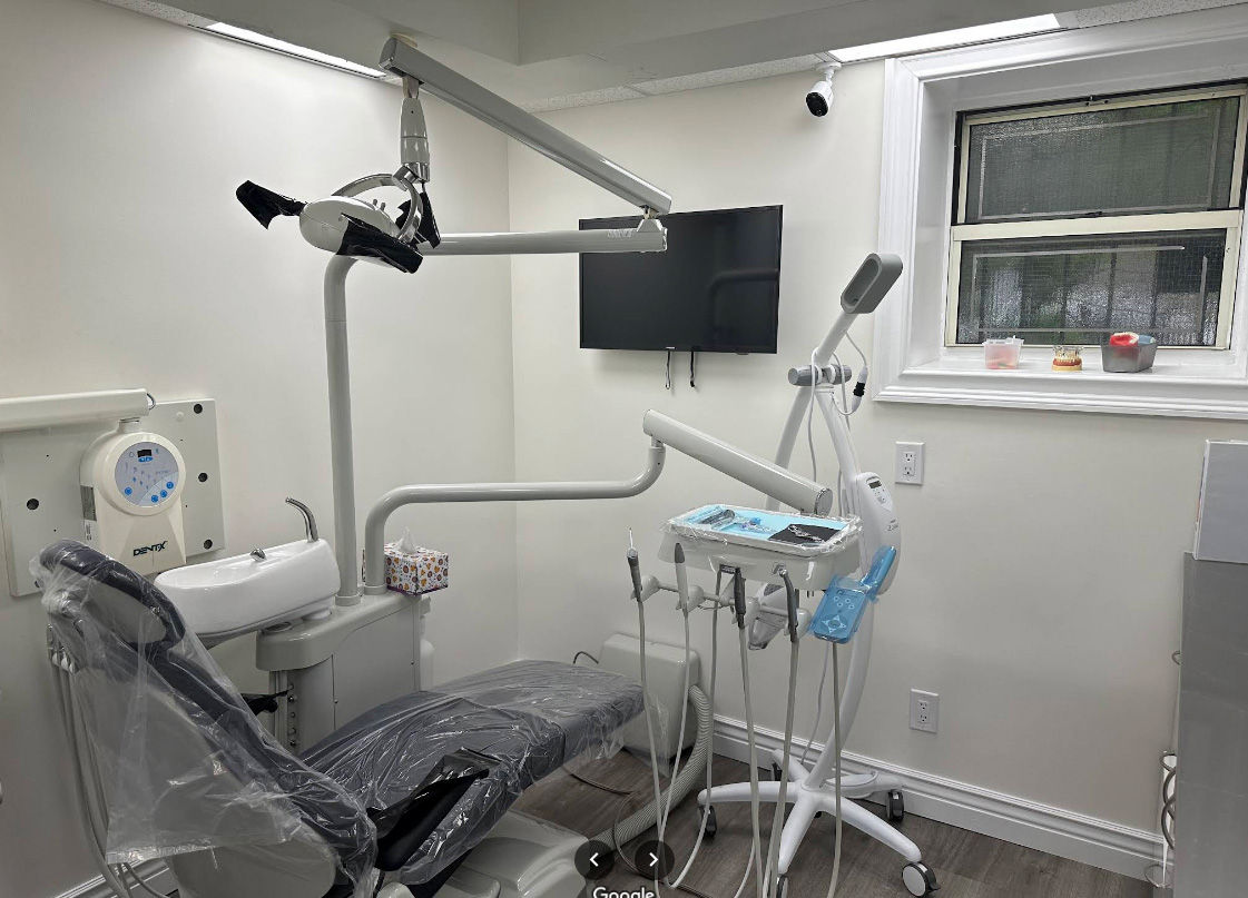 The image shows a dental office interior with dental equipment and a chair, suggesting a professional environment for dental care.