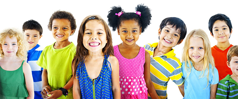 A group of children posing together with bright smiles.
